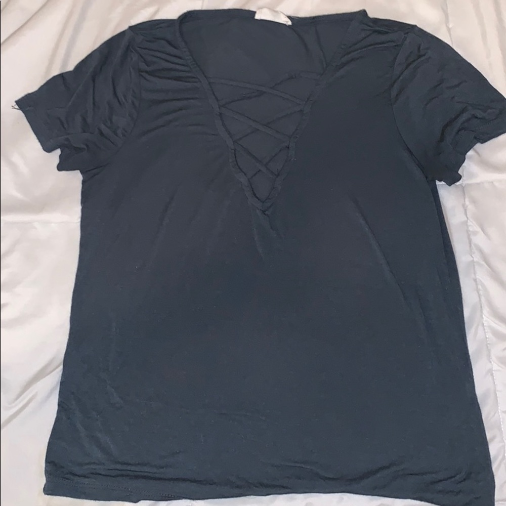 Full-tilt greenish-blue criss-cross top